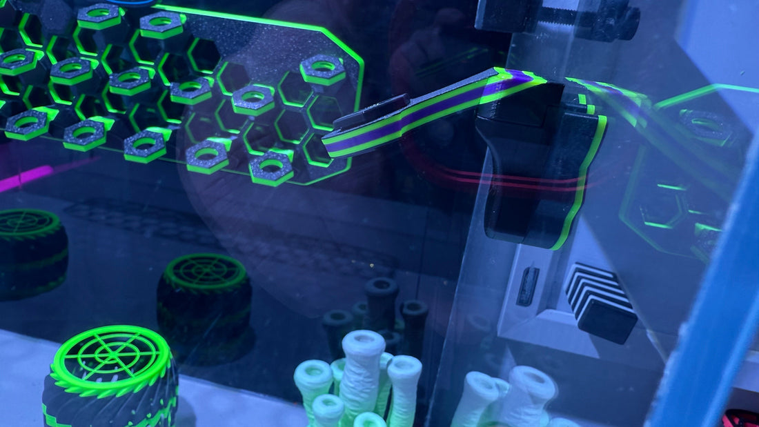 Reef-safe PETG frag racks 3D printed under UV light at Rhino's Reef