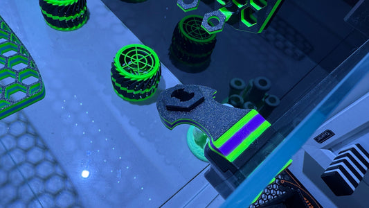 Reef-safe PETG reef gear 3D printed by Rhino's Reef glowing under blacklight